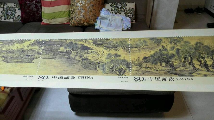 清明上河图礼品,清明上河图套装,中国邮政银行打电话给我,他说要我买一套清明上河图,他说是金的,要3千元,是真是假的?