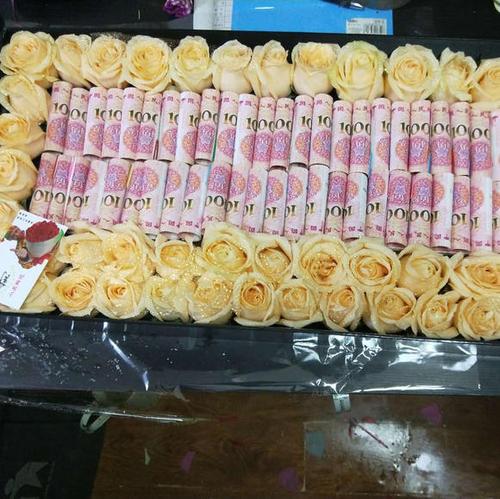 送客户的礼品百元,,10000百元大钞花束怎么包装?