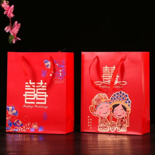 订婚礼品袋,订婚礼品袋子放什么东西,订婚的东西怎么包装拉花?